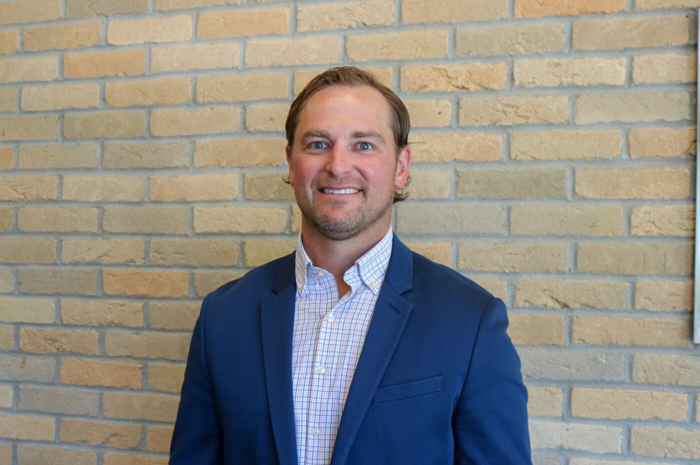 C.J. MacKenzie EV Construction Director of Preconstruction Holland Michigan