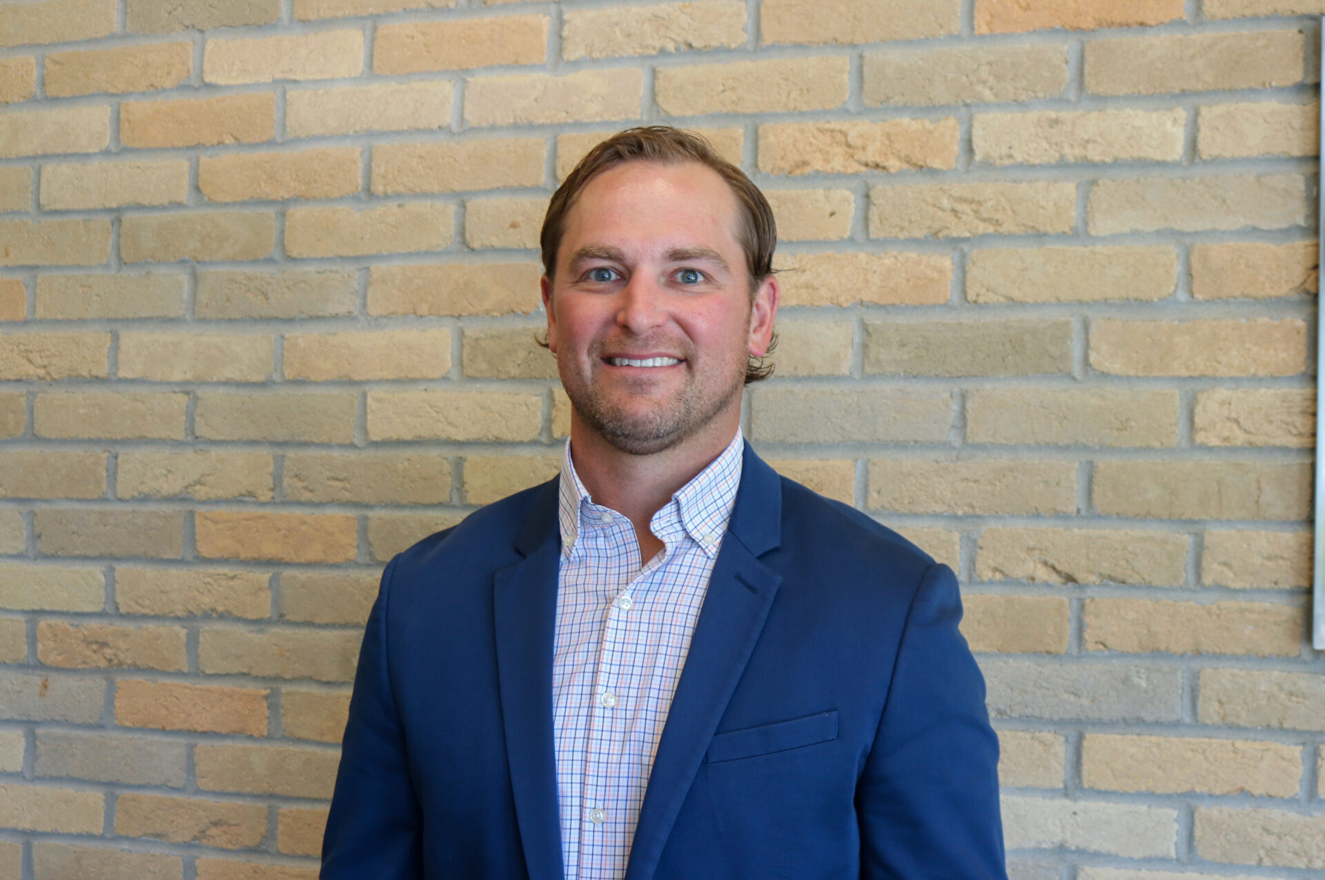 C.J. MacKenzie EV Construction Director of Preconstruction Holland Michigan